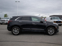 Refined, versatile, and unmistakably upscale, the 2021 Cadillac XT5 AWD Premium Luxury offers a perf... (image 7)