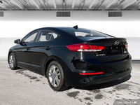 The 2017 Hyundai Elantra in Space Black Pearl features heated front seats, a heated leather steering... (image 3)