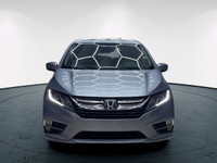 Meet the 2019 Honda Odyssey EX-L RES, a silver front-wheel-drive van that promises a smooth journey... (image 2)