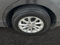 Offering excellent driving manners, this Chevrolet Equinox is Nightfall Grey Metallic in color and i... (image 8)