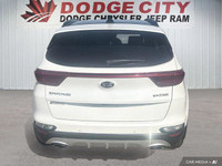 This Kia Sportage delivers a Intercooled Turbo Regular Unleaded I-4 2.0 L/122 engine powering this A... (image 4)