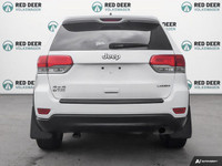 Get behind the wheel of the 2015 Jeep Grand Cherokee Laredo 4 4 in an elegant white finish, perfect... (image 5)