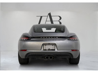 This 2024 Porsche 718 Cayman S delivers pure driving engagement with a 6-speed manual transmission,... (image 6)