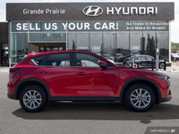 Experience the thrill of confident driving with this 2025 Mazda CX-5 PREF, boasting a sleek red exte... (image 6)