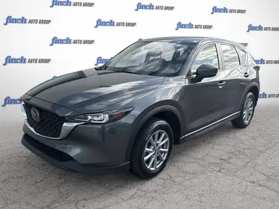 WAS: $35879 NOW: $29998 plus taxes and licensing feesExplore the 2023 Mazda CX-5 GX: A Perfect Blend...