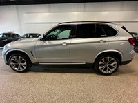 Our 2015 BMW X5 xDrive35i gives you the comfort of an SUV and the spirit of a sports car in Silver M... (image 1)