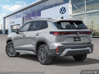 This Volkswagen Tiguan boasts a Intercooled Turbo Regular Unleaded I-4 2.0 L/121 engine powering thi... (image 4)