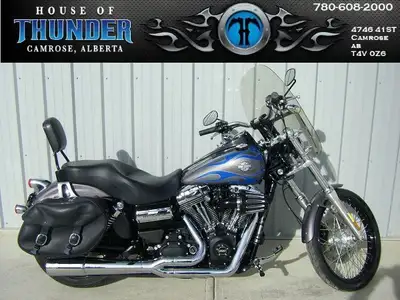 2014 Harley-Davidson FXDWG Wide Glide Low-down and beefy, it’s got old-school chopper looks with the...
