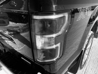 The 2018 Ford F-150 XLT is a popular full-size pickup truck known for its rugged performance, impres... (image 3)