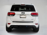 This 2015 Jeep Grand Cherokee SRT pairs aggressive V8 performance with refined luxury and bold styli... (image 6)