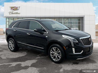 The 2023 Cadillac XT5 includes a hands-free liftgate, panoramic roof, heated front seats, and leathe... (image 6)