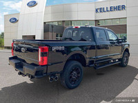 This Ford Super Duty F-250 SRW has a durable Intercooled Turbo Diesel V-8 6.7 L/406 engine powering... (image 4)