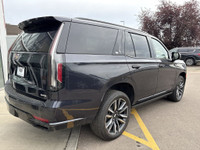 The 2023 Cadillac Escalade Sport Platinum stands out in Galactic Grey Metallic with 22-inch 12-spoke... (image 7)