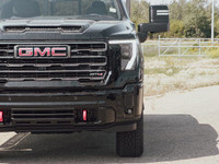 The 2025 GMC Sierra 3500 AT4 stands tall as a powerhouse of rugged sophistication, engineered to tak... (image 3)