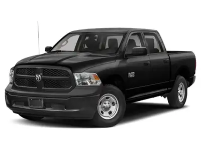 The 2021 Ram 1500 Classic Express 4x4 Crew Cab 57 Box is a bold black truck with an impressive 44 dr...