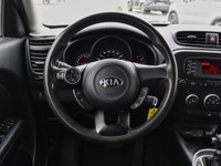 Experience practical versatility and distinctive design with the 2015 Kia Soul LX in Titanium Gray.... (image 9)