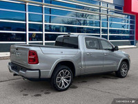 This Ram 1500 has a durable Twin Turbo Premium Unleaded I-6 3.0 L/183 engine powering this Automatic... (image 5)
