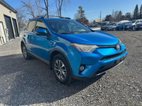 The 2017 Toyota RAV4 Hybrid XLE in a stunning blue finish offers exceptional control with its AWD dr... (image 6)