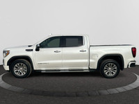 The All New GMC Sierra has been redefined from Hood to Hitch. This 4WD White Sierra is a Crew Cab Pi... (image 1)