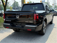 Pristine condition and Fully loaded Honda Ridgeline Touring with LOW KMs! This 4 door All Wheel Driv... (image 2)