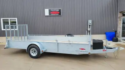 6ft x 15ft 5200lb Galvanized Duratrail Utility Trailer. Features: Hot Dipped Galvanized Electric Bre...