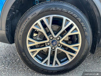 This Ford Escape boasts a Intercooled Turbo Regular Unleaded I-3 1.5 L/91 engine powering this Autom... (image 7)