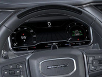 The 2025 GMC Sierra 1500 Denali Ultimate, finished in Downpour Metallic with a refined Alpine Umber... (image 6)