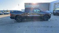 This 2025 RAM 1500 SPORT CREW CAB 4X4 has the following options Leather Trimmed Bucket Seats, Remote... (image 9)