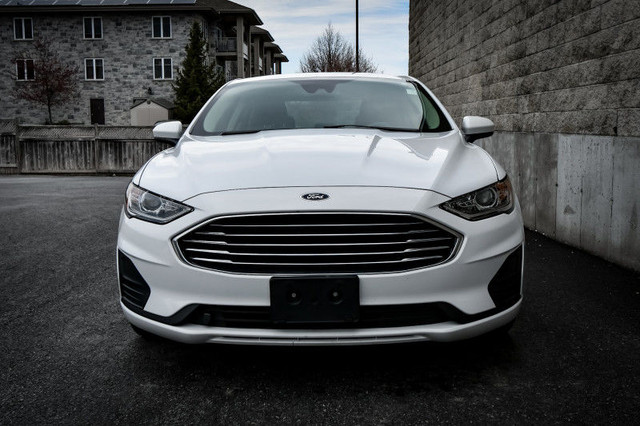 2020 Ford Fusion Hybrid SE • HEATED SEATS • PARK ASSIST • NAV in Cars & Trucks in Cornwall - Image 4