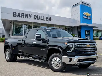 Presenting the 2025 Chevrolet Silverado 3500HD 4WD Crew Cab Long Box LTZ in a striking black color,...