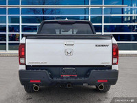 Recent Arrival! Looking for a reliable truck that isn't too big? Then check out this 2023 Honda Ridg... (image 4)