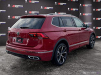 This Volkswagen Tiguan has a trusty Intercooled Turbo Regular Unleaded I-4 2.0 L/121 engine powering... (image 5)