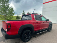 Our 2023 Honda Ridgeline Touring in Radiant Red Metallic is a local lease return! Call to book an ap... (image 7)