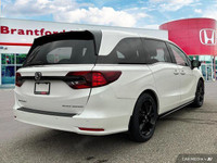 This 2023 Honda Odyssey Black Edition boasts a luxurious Platinum White Pearl exterior and a strikin... (image 5)