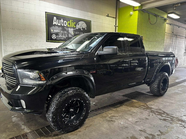 2016 Ram 1500 4WD Quad Cab 140.5 Sport in Cars & Trucks in Laval / North Shore