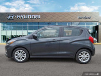 This 2021 Chevrolet Spark 1LT Hatchback offers surprising practicality in a compact package. Its pep... (image 1)