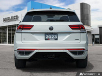 Command the road in this sleek 2023 Volkswagen Atlas Cross Sport Execline. This pristine Oryx White... (image 4)