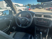This Volkswagen Tiguan delivers a Intercooled Turbo Regular Unleaded I-4 2.0 L/121 engine powering t... (image 8)