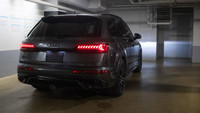 This Audi Q7 has a powerful Intercooled Turbo Gas/Electric V-6 3.0 L/183 engine powering this Automa... (image 7)