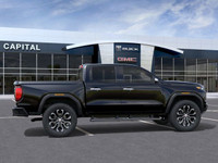 This 2025 GMC Canyon in Onyx Black is equipped with 4WD and Turbocharged Gas I4 2.7L/ engine. The GM... (image 5)