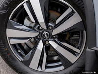 This 2024 Nissan Rogue SL boasts a stunning Boulder Grey Pearl exterior and a sophisticated Graphite... (image 5)