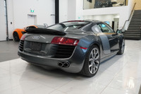 The 2008 Audi R8 Quattro with a gated manual transmission is an iconic mid-engine supercar that deli... (image 5)