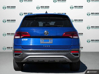 This 2022 Volkswagen Taos Comfortline is a practical and efficient compact SUV that offers smooth pe... (image 5)