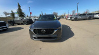 This Mazda CX-5 is equipped with: Leather Seat Upholstery, Power moonroof, Heated front seats, Heate... (image 5)