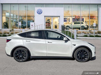 This Tesla Model Y delivers a Electric engine powering this Automatic transmission. Window Grid Ante... (image 5)