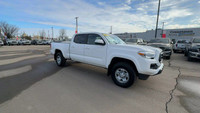 This Toyota Tacoma is equipped with: Fabric Seat Trim, AM/FM radio, 7 Inch Colour Touch Screen, Exte... (image 2)