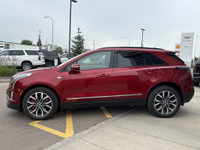 Stand out in Radiant Red Tintcoat with this premium 2023 Cadillac XT5 Sport AWD, blending luxury, pe... (image 2)