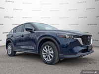 Experience the versatility and safety of this 2025 Mazda CX-5. This pre-owned SUV boasts a low 26,24... (image 8)