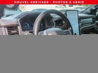 Le Ford F-150 Lightning Lariat 2023, avec sa grosse batterie, offre une autonomie impressionnante al... (image 3)