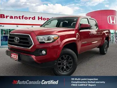 Conquer any terrain with this 2023 Toyota Tacoma Crew Cab Pickup. Its robust four-wheel-drive system...
